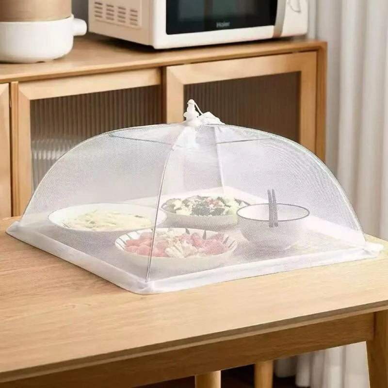 Proteja frutas, bolos e refeições com o Protetor Dobrável para Alimentos. Tela anti-insetos, dobrável, lavável e ideal para uso interno e externo.